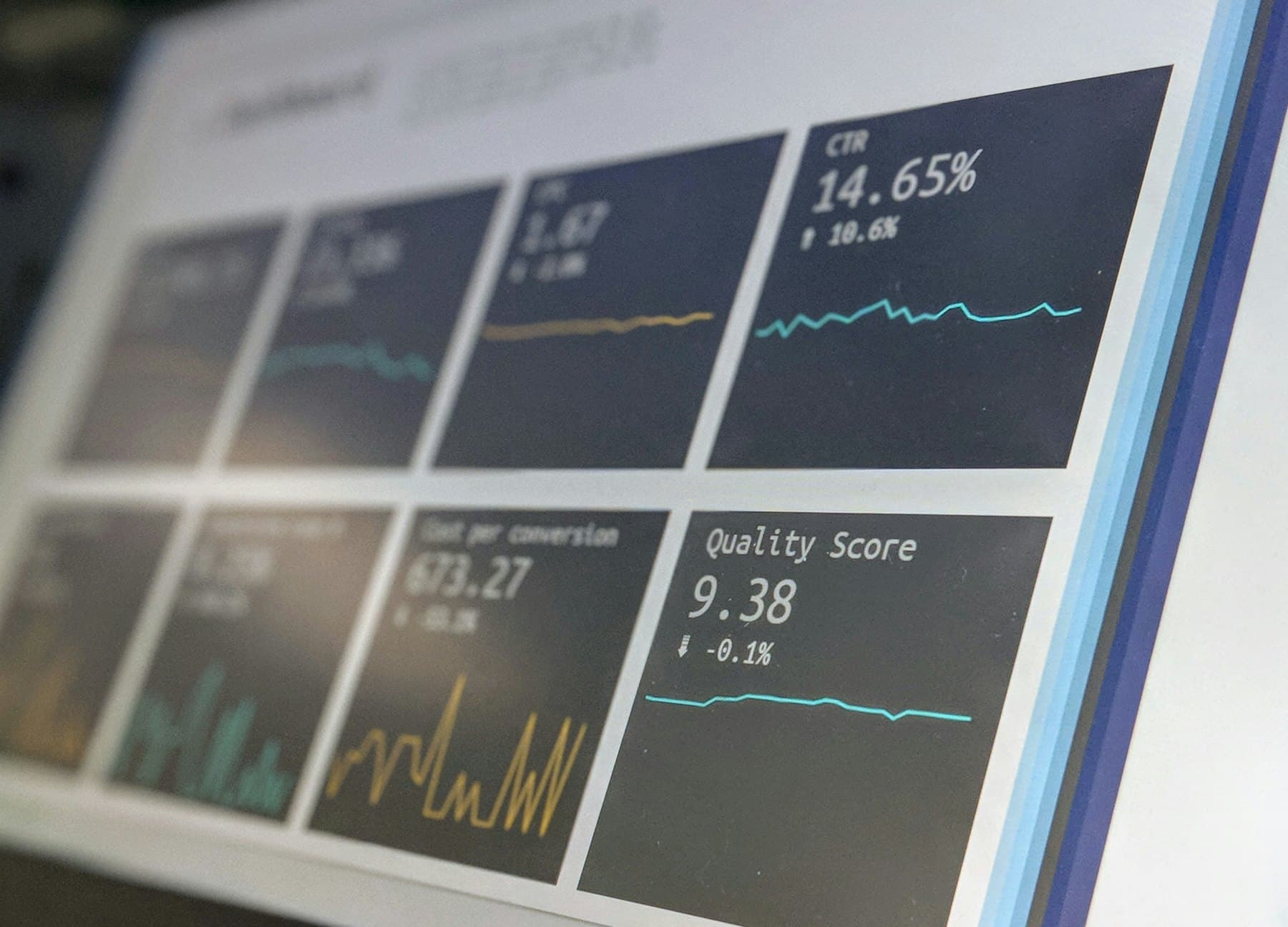 Monitoring dashboard on screen showing live system performance metrics